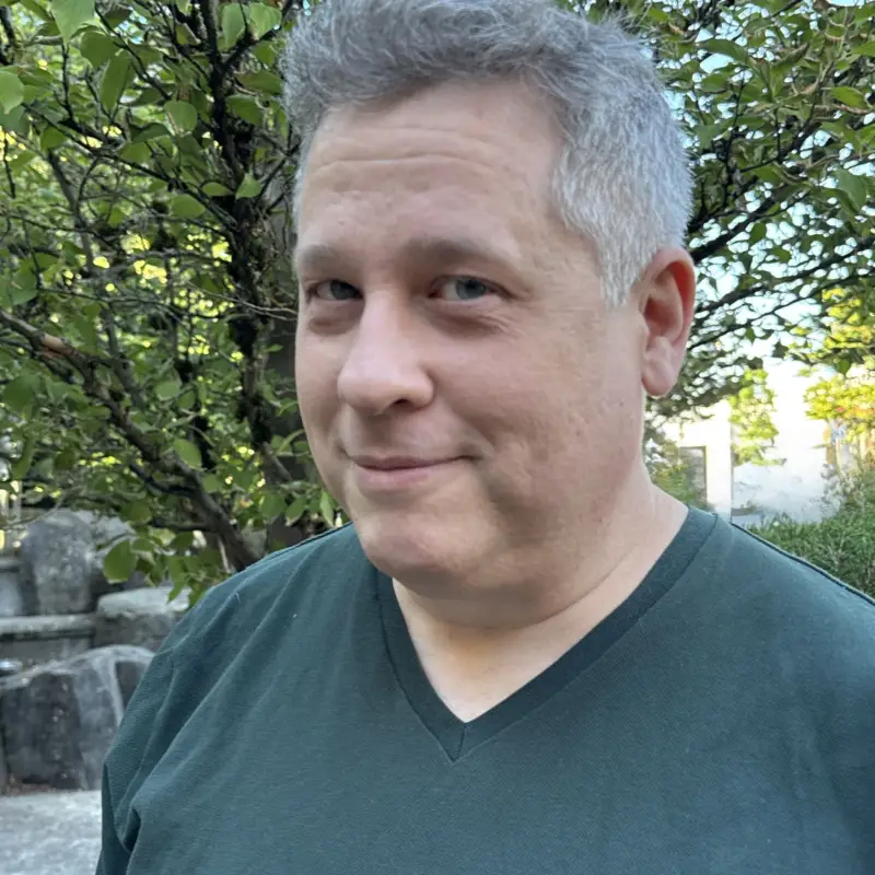 Philip Gordon (he/him headshot